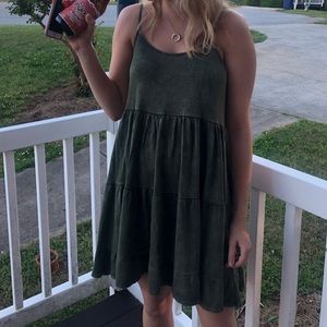 Boutique swingy soft green tiered dress